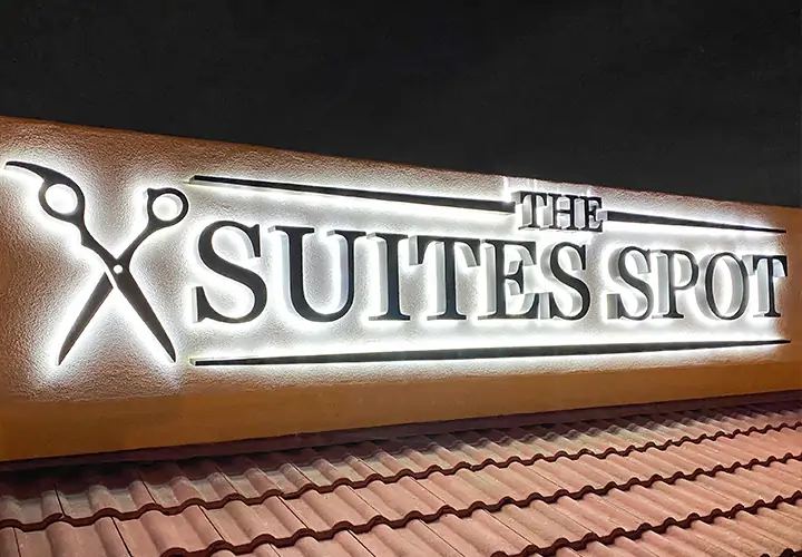 The Suites Spot large backlit storefront sign